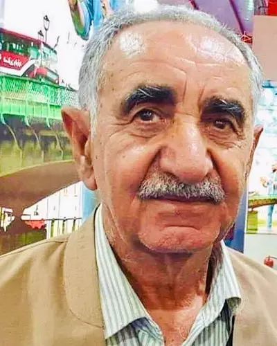 Old man with mustache in a jacket